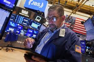 Dow ends lower after topsy-turvy week, as Intel's outlook weighs on ...