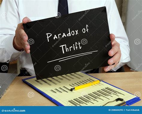 Business Concept about Paradox of Thrift with Phrase on the Sheet Stock ...