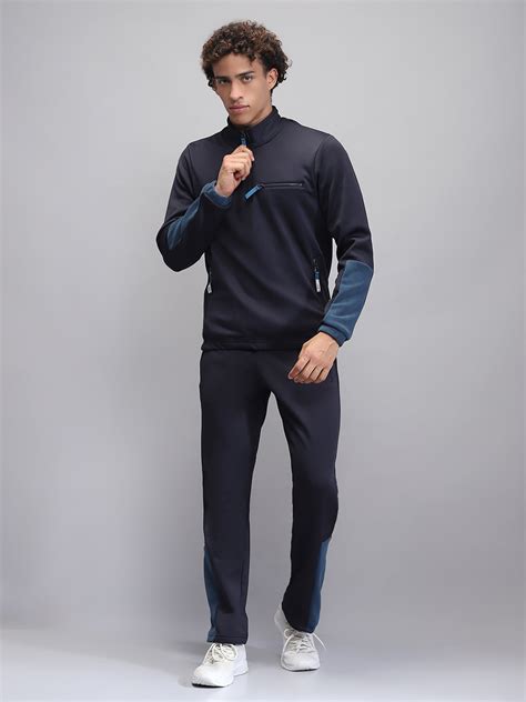 Buy Men Navy Blue Solid Mock Neck Full Sleeve Winter Tracksuit Online ...