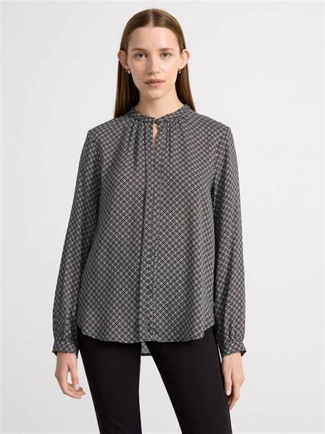 Blus i bäckebölja med volang | Lindex