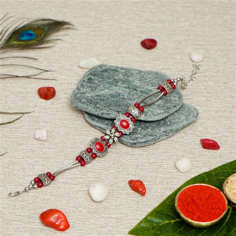 Designer Stone Rakhi with Best Brother Trophy and Roli Chawal Pack ...