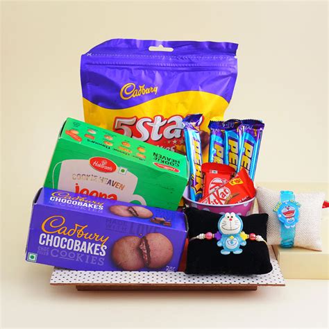 Send Two Doraemon Kids Rakhi with Chocolates N Cookies Online ...