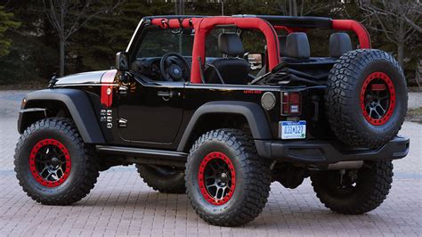 Download Black Jeep Wrangler With Red Accent Wallpaper | Wallpapers.com