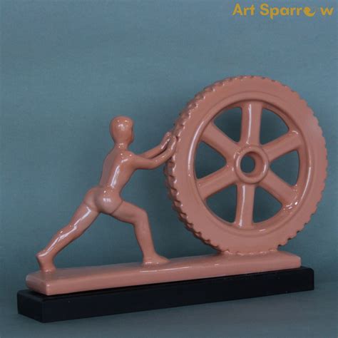 Man Pushing Wheel Human Strength Showpiece