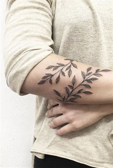 arm vine tattoos for women