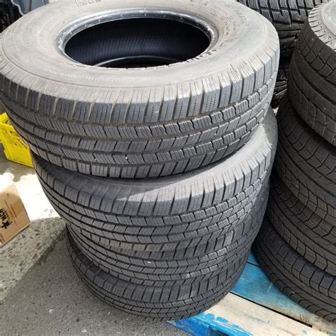 SET OF 4 MICHELIN 235/75 R15 TIRES - Big Valley Auction