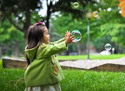 Image result for Kids Playing Spring Time Bunny