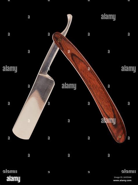 Vintage barber shop razor tool on black Stock Photo - Alamy