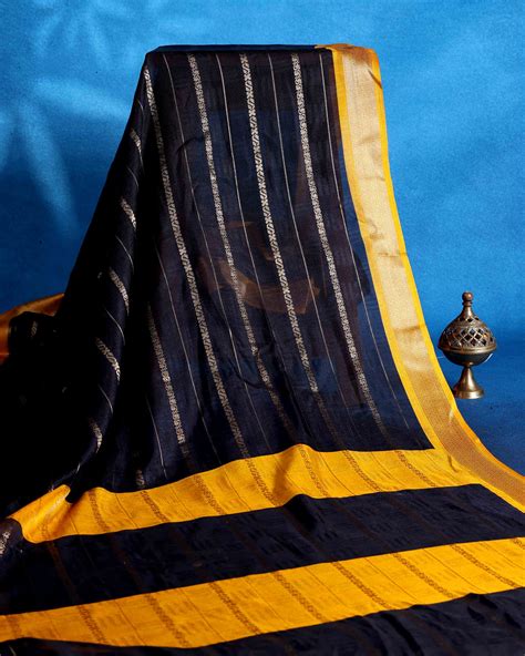 Elegant Dola Saree with Vertical Stripes and Traditional Border