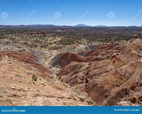 Red Claystone Hills Lead into Long Canyon Along Burr Trail Road in Utah ...