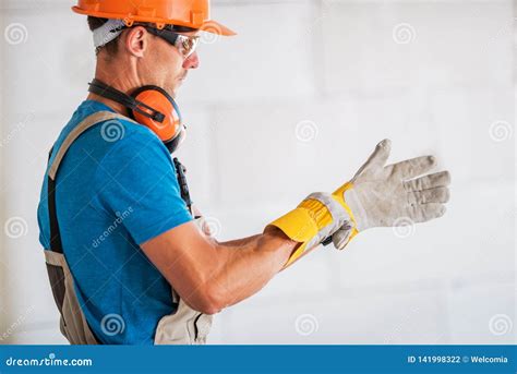 Worker Wearing Safety Gloves Stock Photo - Image of safety, preparation ...