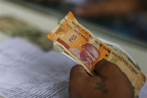 INR/USD: Rupee at Low Even as India Spends $100 Billion From Reserves ...