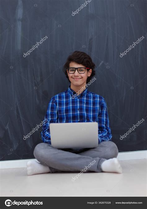 Arab Teenager Using Laptop Work Homework Watch Online Education While ...