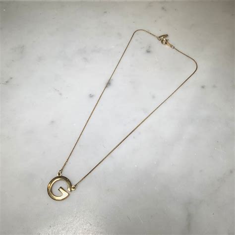 vintage GIVENCHY metal gold color " g " logo pendant necklace | NOIR ONLINE