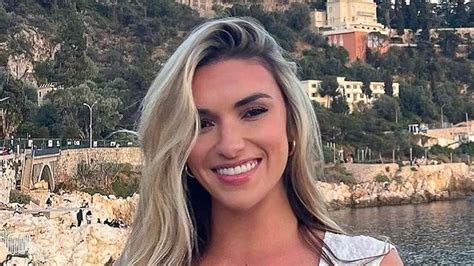 World's sexiest volleyball star Kayla Simmons shows off peachy bum as she hits beach in tiny ...