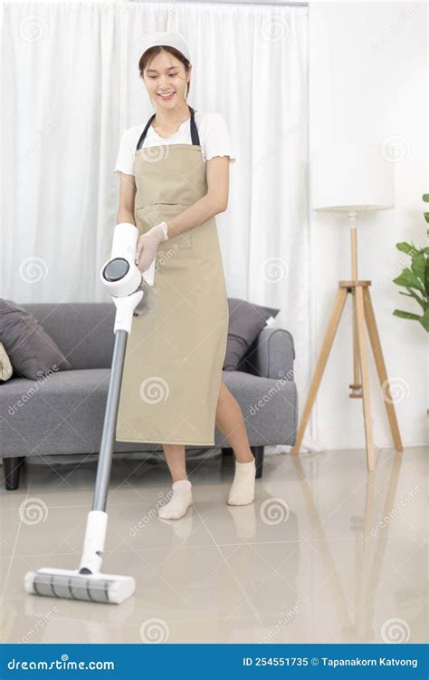 Beautiful Woman Vacuuming the Floor of Her Living Room Stock Image ...