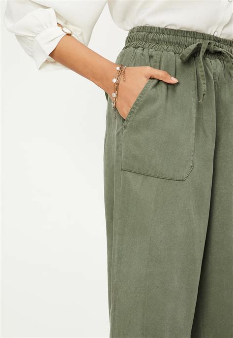 Buy Women Solid Ankle-Length Trousers Online at just Rs. 1199.0 ...