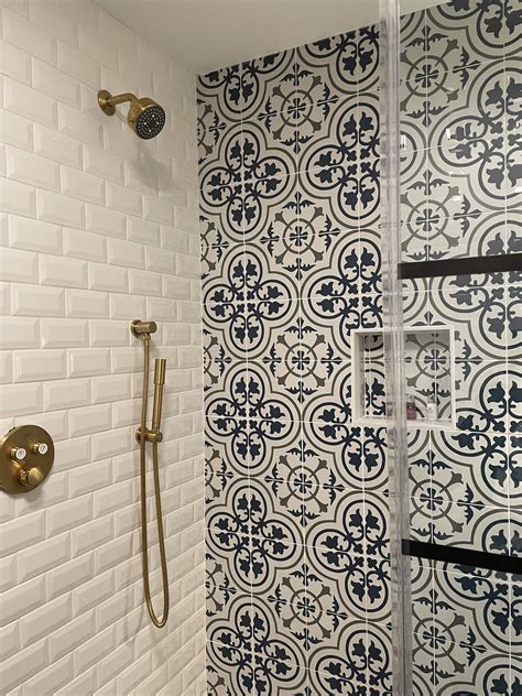 Blue and White Bathroom with Tiled Walls