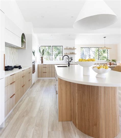 White Kitchen With Wood Island