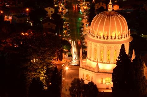 Temple at night illuminated with light from decorations