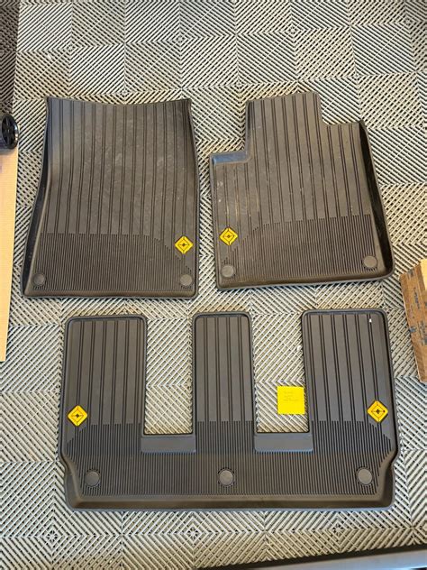 Texas - Rivian R1S OEM rubber floor mats (yellow Rivian logo) | Rivian ...