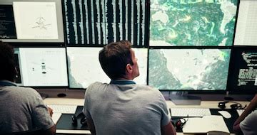 Screen man and meteorology with monitor for weather satellite maps and ...