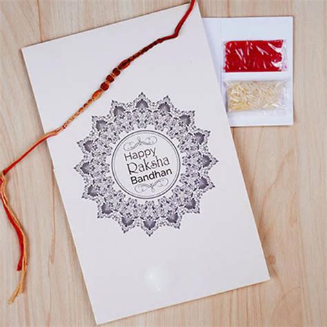 Send Elegant Red Rudraksh Rakhi Online | Rakhibazaar.com