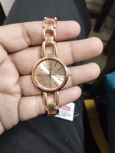 Titan Rose Gold Dial Analog Watch for Women -NR2642WM01 : Amazon.in ...