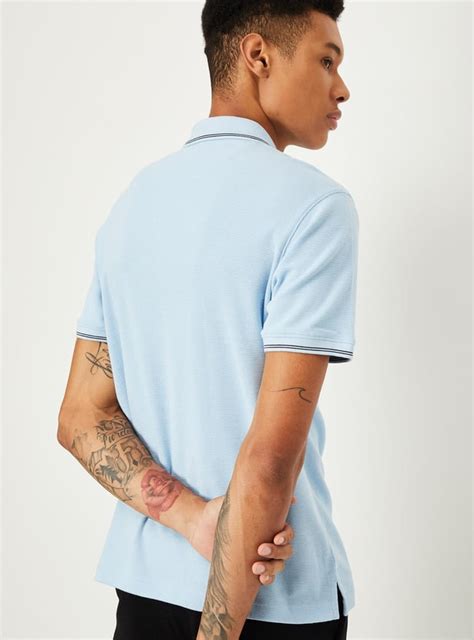 Buy Men Regular Fit Solid Polo T-shirt Online at just Rs. 499.0 ...