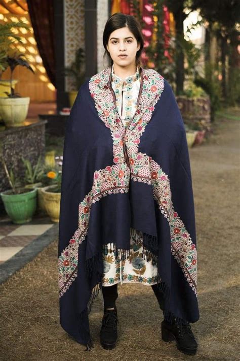 Navy blue color kashmiri shawl with aari jaal gives a trendy look