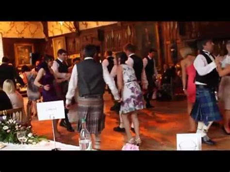 Traditional Ceilidh Dancing At A Scottish Wedding [1fb7d9]