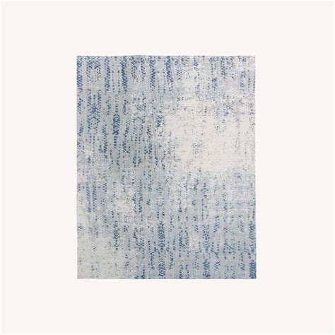 West Elm Distressed Foliage Rug 9X12 - AptDeco