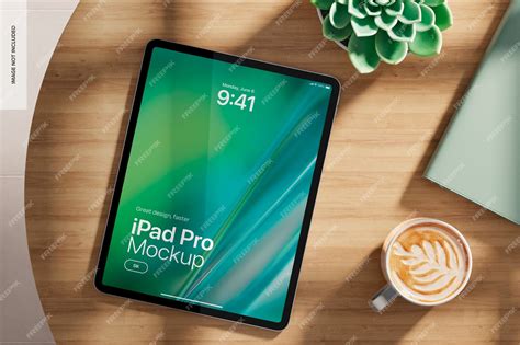 Ipad pro on home desk mockup top view | Premium PSD