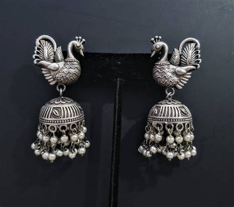 How the Peacock Stole Our Hearts (and Our Fashion) – Inhika.com