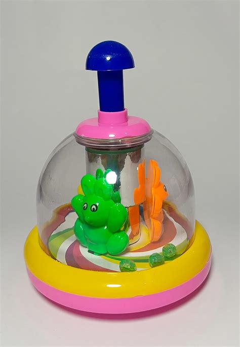 Buy Press and Spin Toy Online at Low Prices in India - Amazon.in