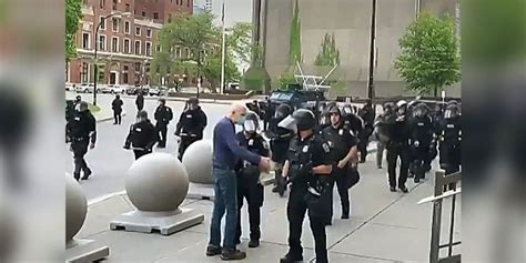 Officers who pushed Floyd protester cleared by arbitrator