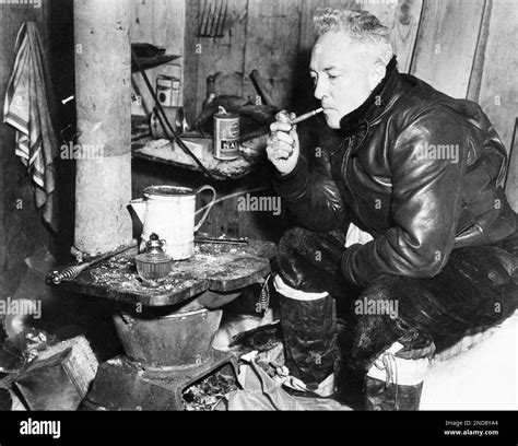 Rear Adm. Richard E. Byrd smokes his 12- year old pipe with tobacco of ...
