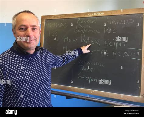 German language teacher Loris Rossetto standing in front of a ...