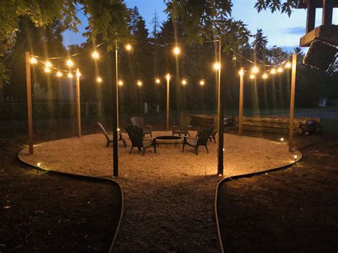 .This is my Fire pit and patio area with pea gravel and string lights ...