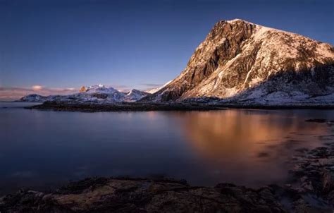 Download wallpaper sea, mountains, stones, rocks, dawn, coast, Norway ...