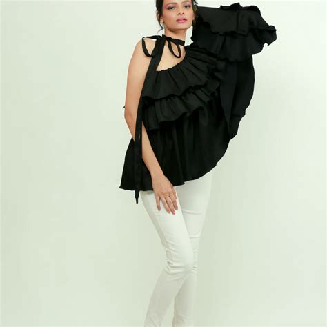 Black one shoulder top features a tie-up collar with ruffles and ruche ...