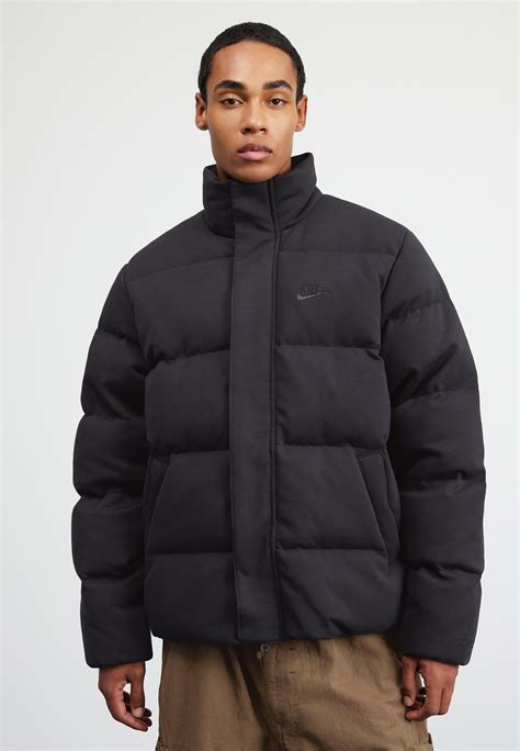 Nike puffer jacket black online