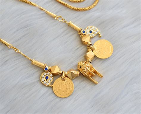 Gold tone blue-white stone mango Lakshmi coin thiru mangalyam dj-40918 ...