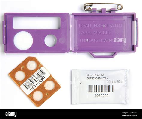 Film badge radiation dosimeter. Film badge dose meters (dosimeters) are ...