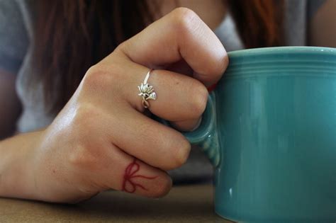 Red string tattoo