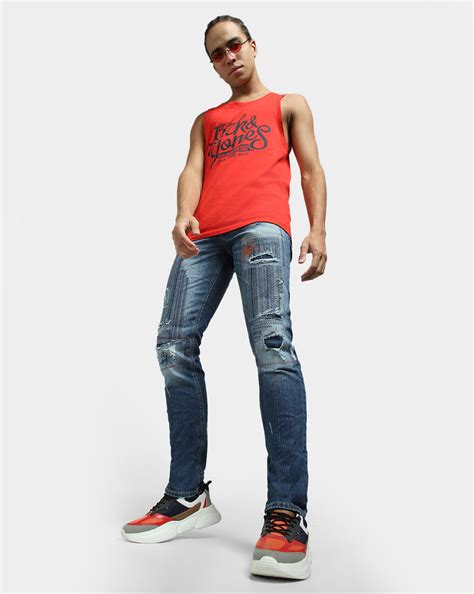 Blue Low Rise Distressed Glenn Slim Fit Jeans
