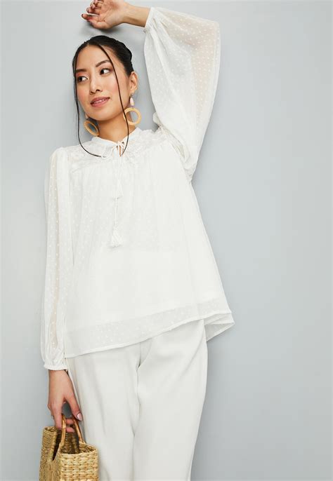 Buy Women Embroidered Tie-Up Neck Top Online at just Rs. 799.0 ...