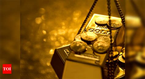 Gold trades in tight range on US debt limit deal, Fed rate hike bets ...
