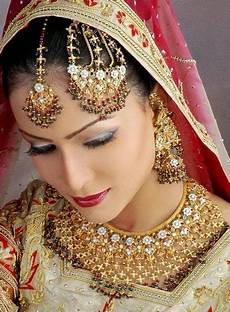 White Wedding Dress With Indian Jewelry by Fashion Indian Fashion International Fashion White Wedding Dress With Indian Jewelry