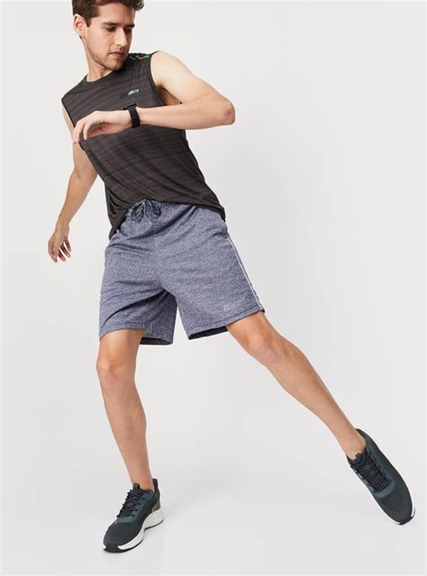 Buy Men Textured Elasticated Regular Fit Sports Shorts Online at just ...